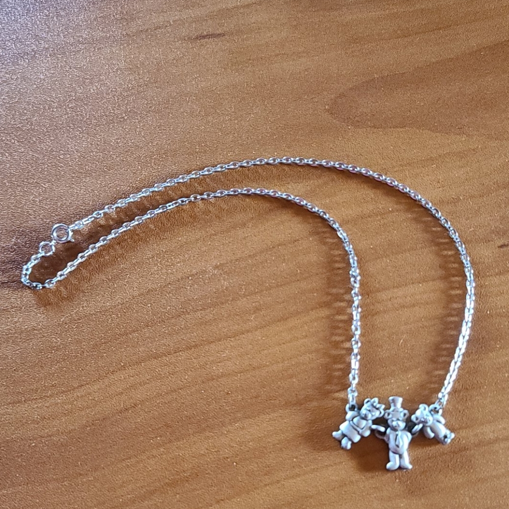 Vintage sterling silver family of bears necklace.